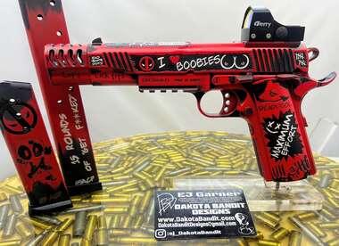1911 Compensator painted to match deadpool
